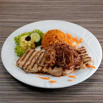 Schweinesteak mit gerösteten Zwiebeln